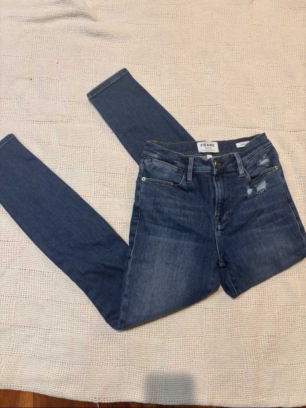 Frame Denim Skinny High-Rise Jeans in Dark Wash Blue